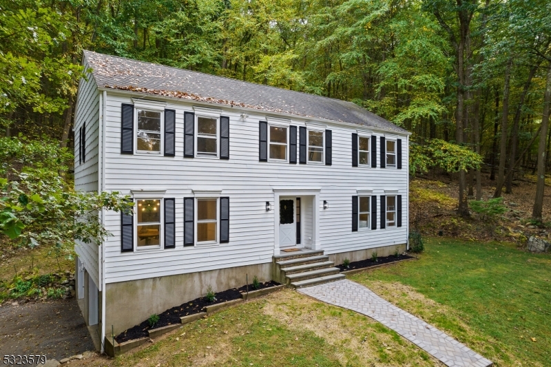 a house with trees in front of it