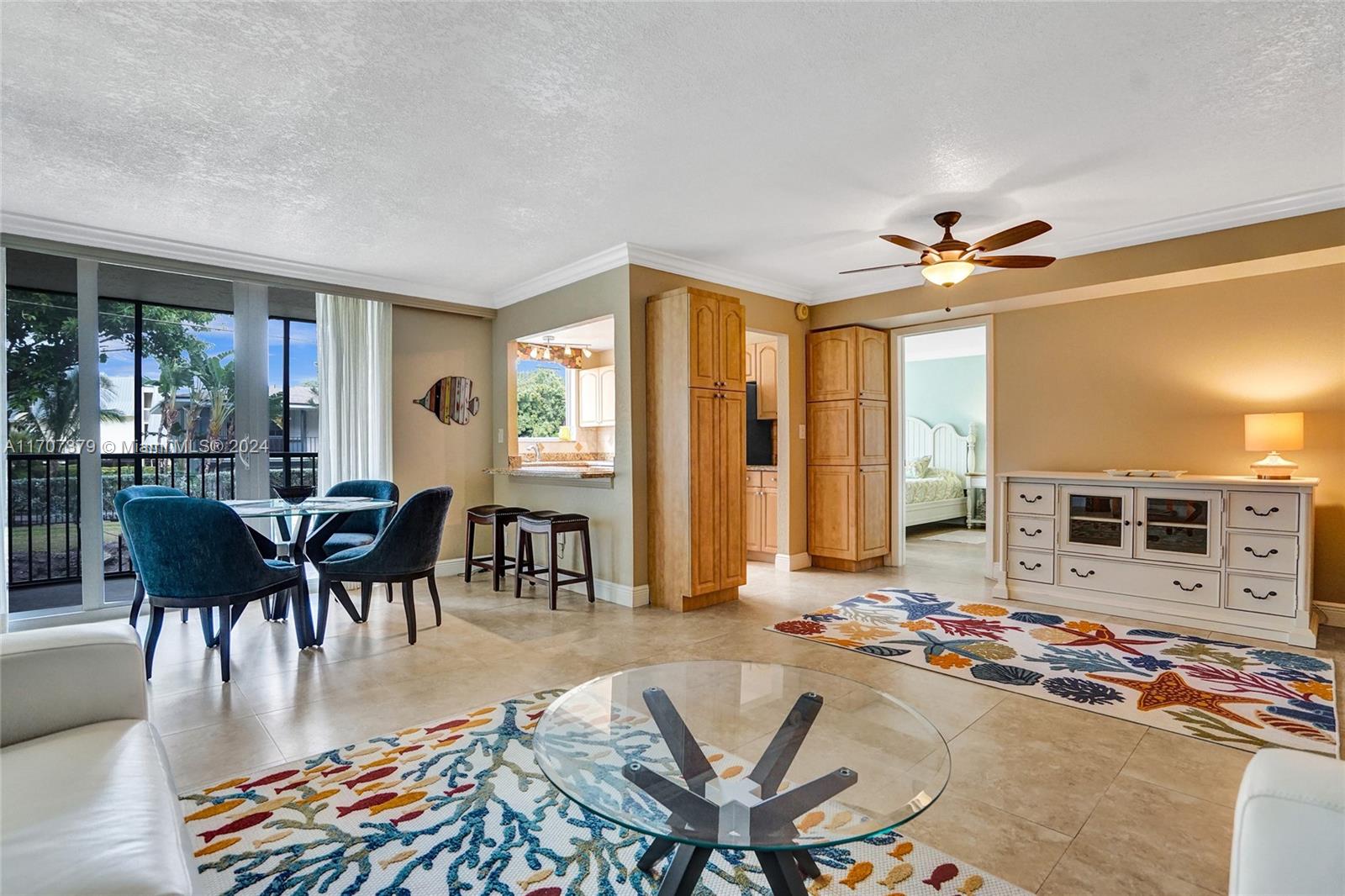 a view of a livingroom with furniture window and wooden floor