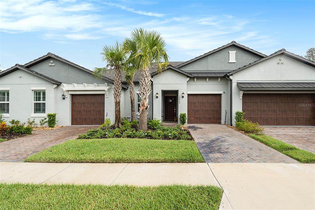 BETTER THAN A NEW CONSTRUCTION! Move-in ready, single-story villa with NO BACK neighbors feels just like a brand new home