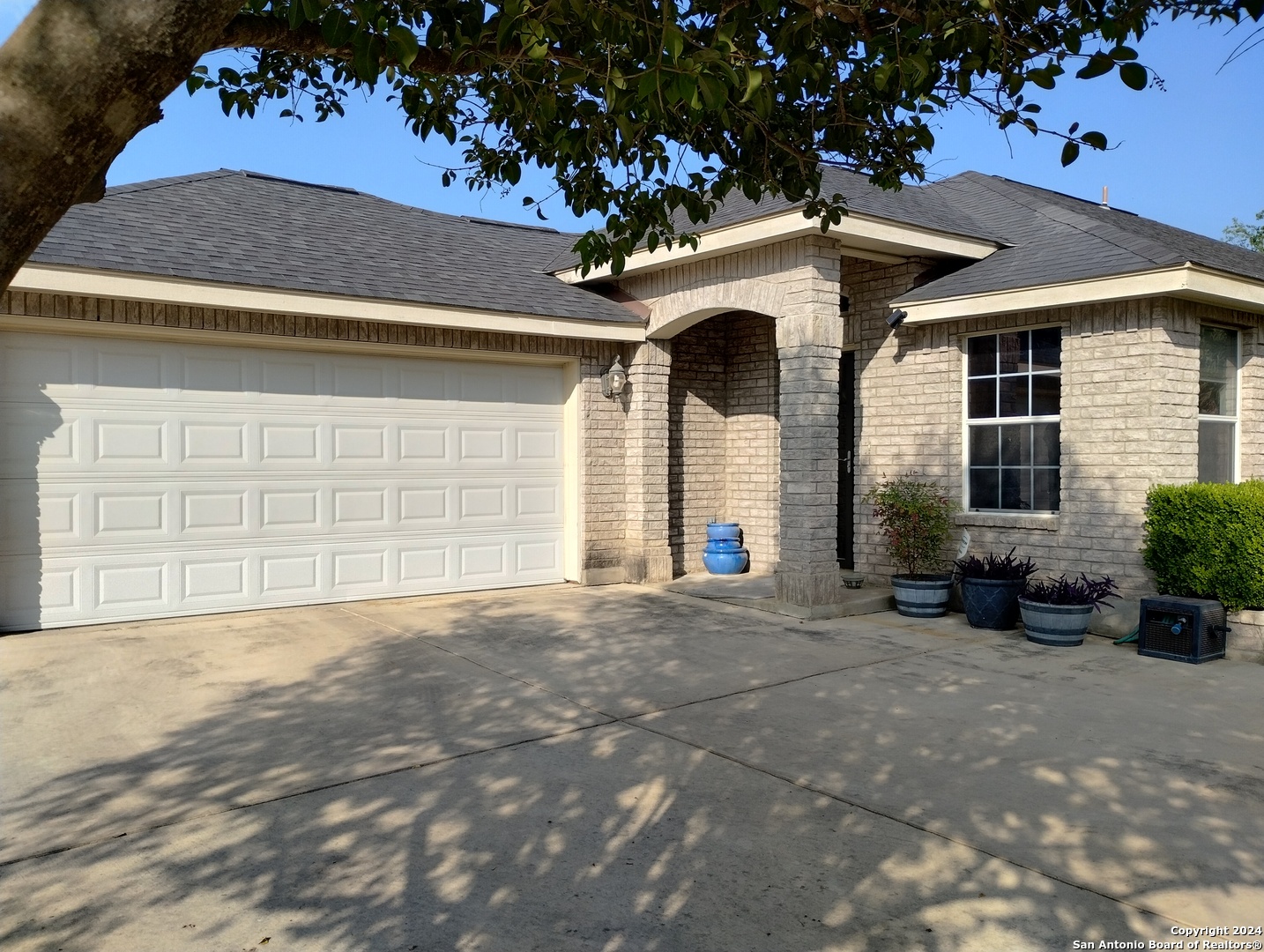 a view of a house with a garage