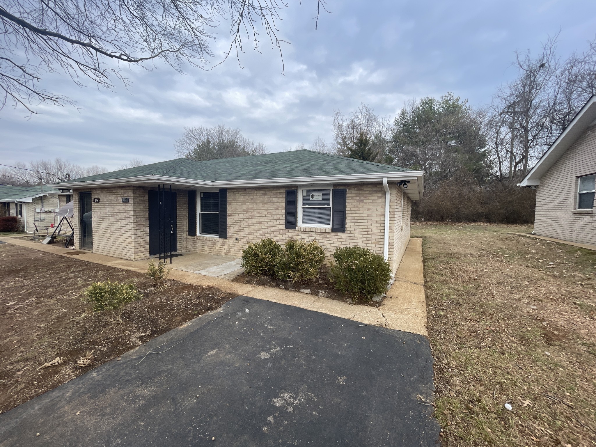 front view of house with a yard