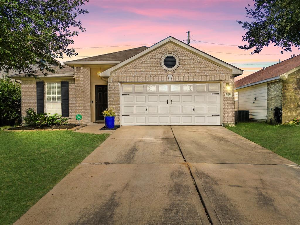 Say hello to 20710 Rainmead Drive! This charming single-story home with beautiful curb appeal, features a classic brick exterior, complemented by a well-maintained front lawn and a spacious driveway leading to a two-car garage with stylish windows. The inviting entryway sets the tone for this cozy and welcoming home, perfect for comfort and convenience in a desirable neighborhood.