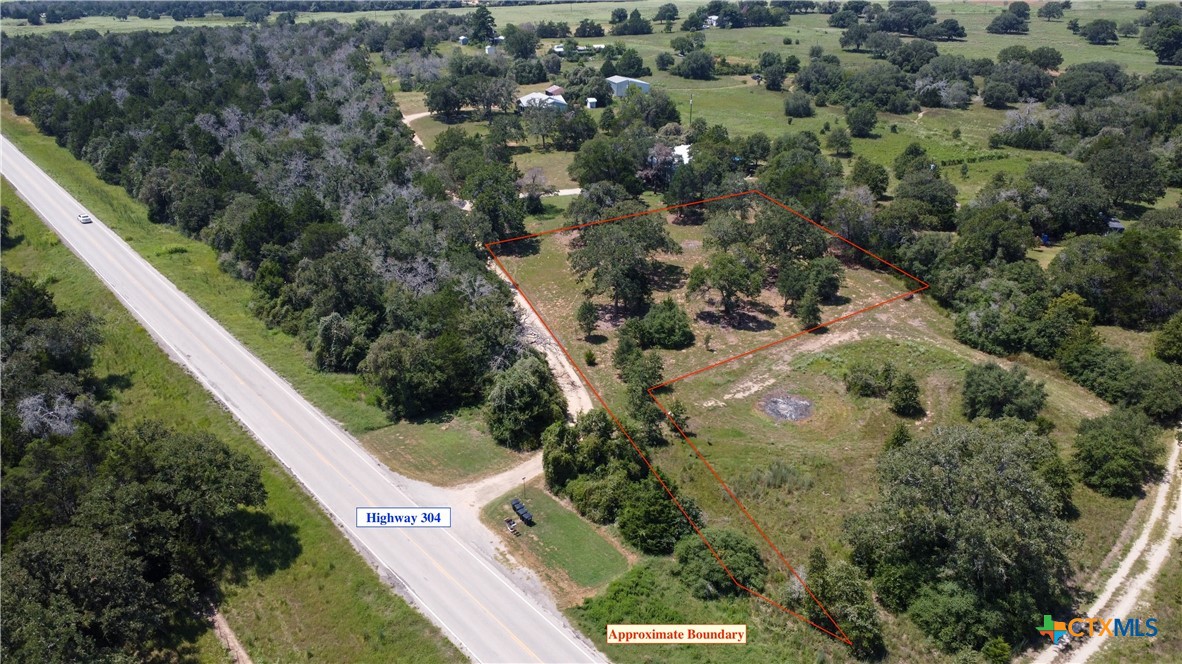 an aerial view of residential house with outdoor space