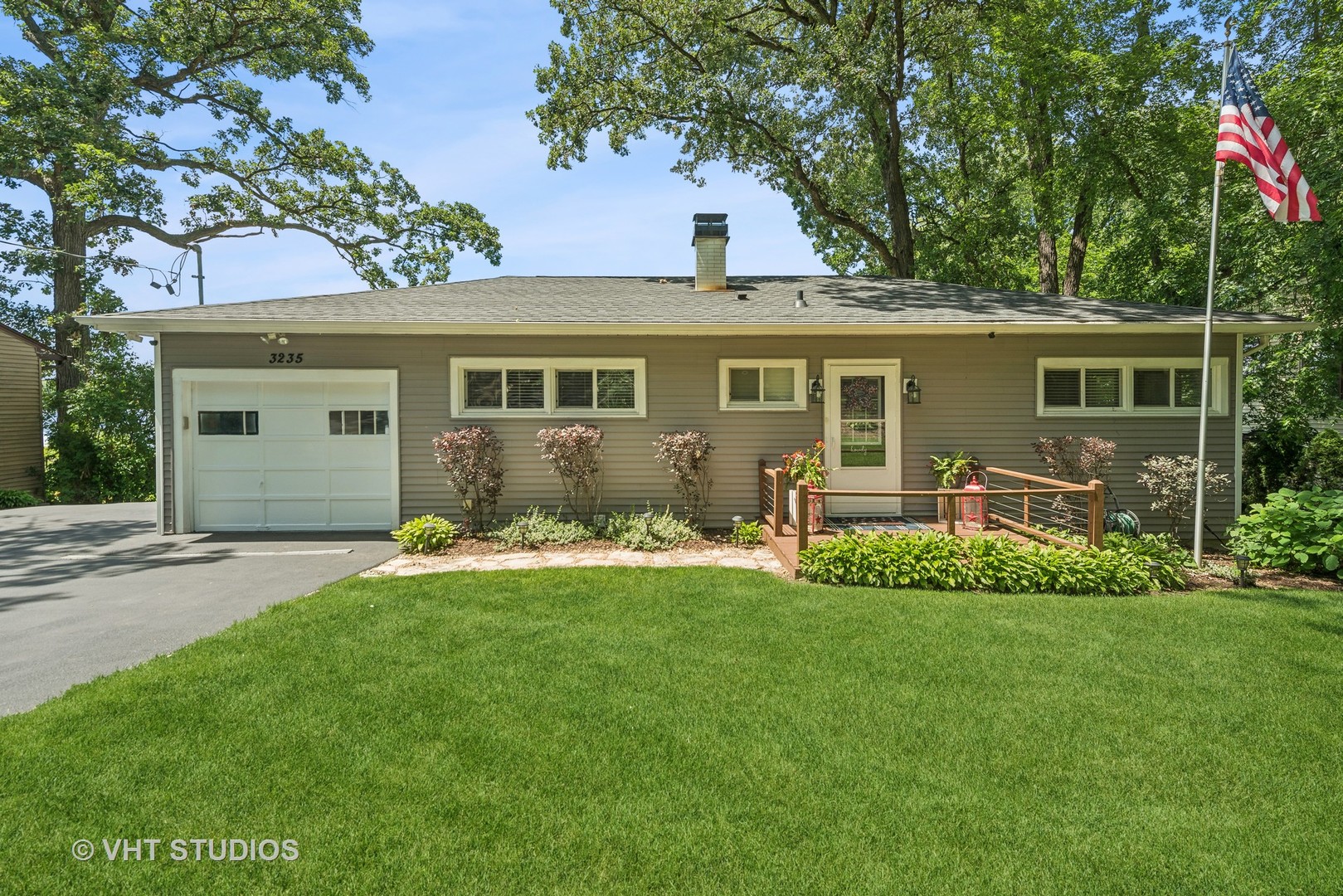 front view of a house that has a yard