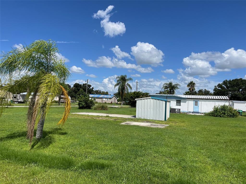 a view of a house with a big yard