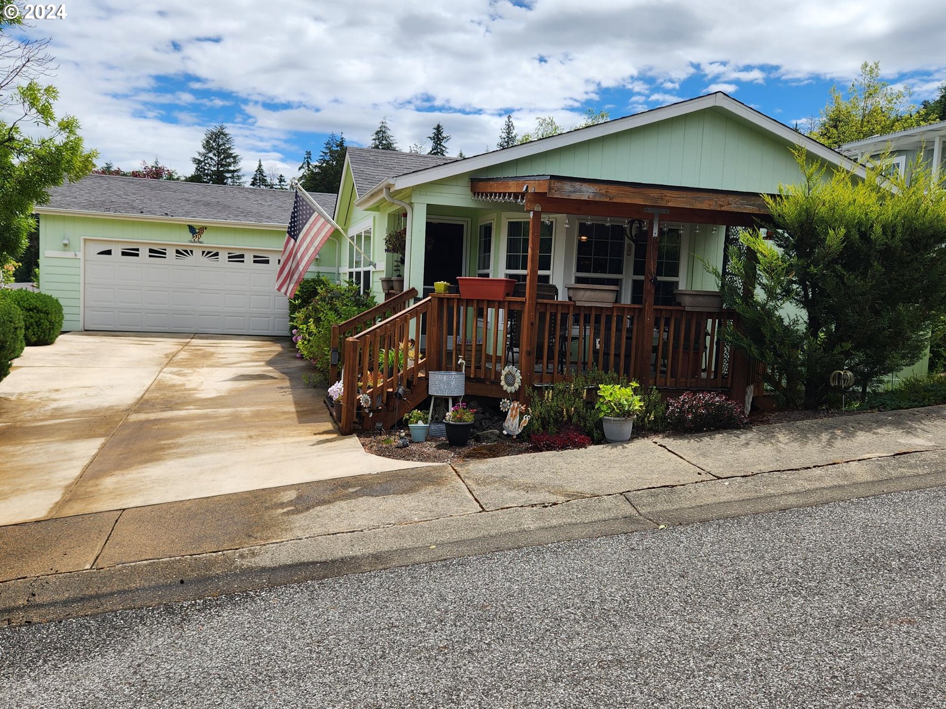 front view of a house with a street