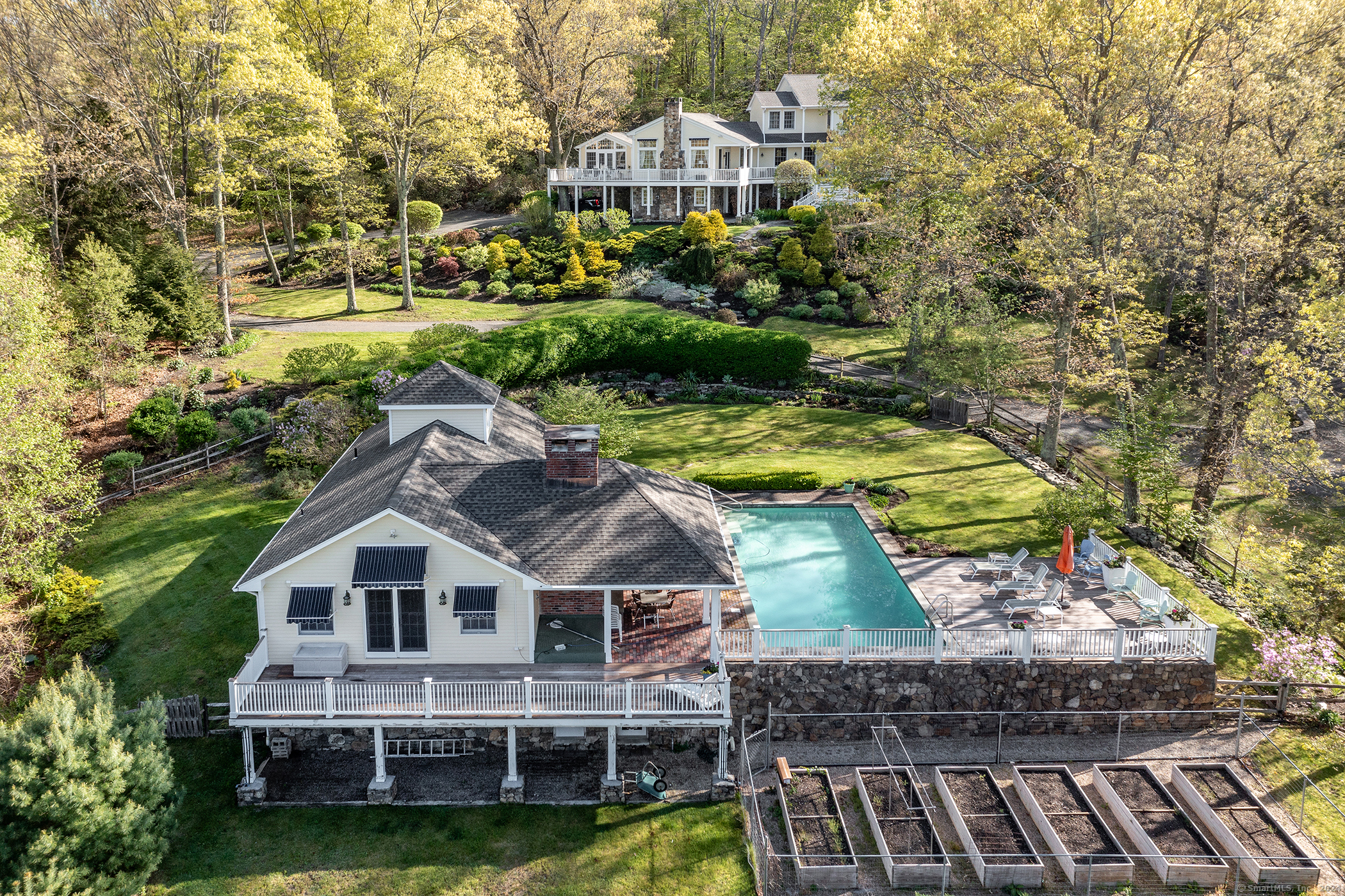 a aerial view of a house with a yard