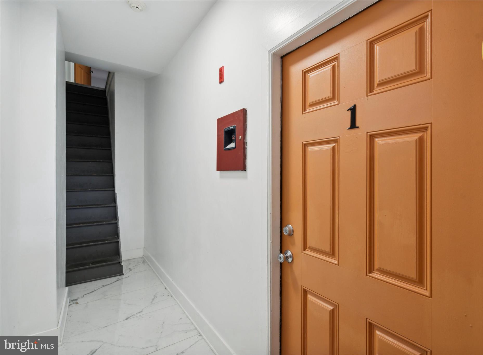 a view of an entryway with staircase