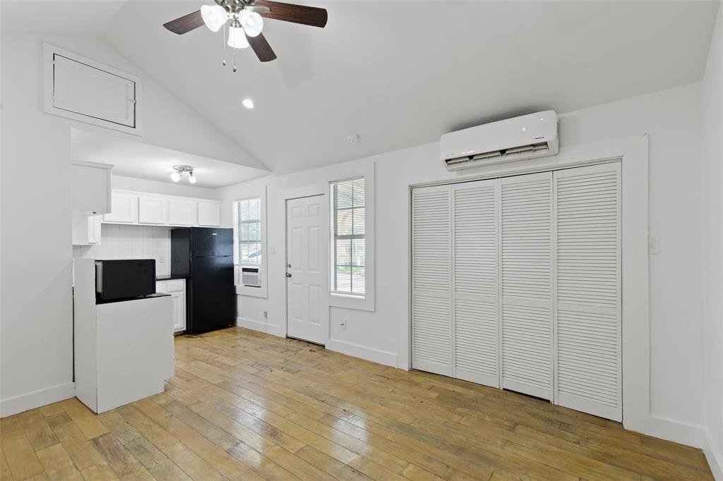 a view of a kitchen with a sink and cabinet area