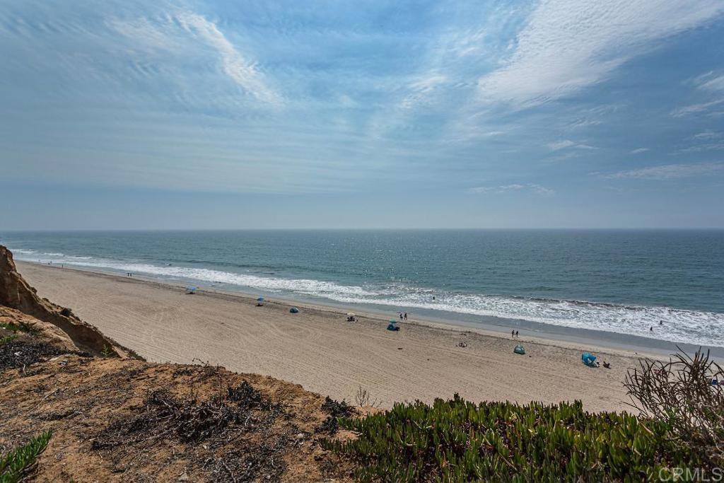 a view of beach and ocean