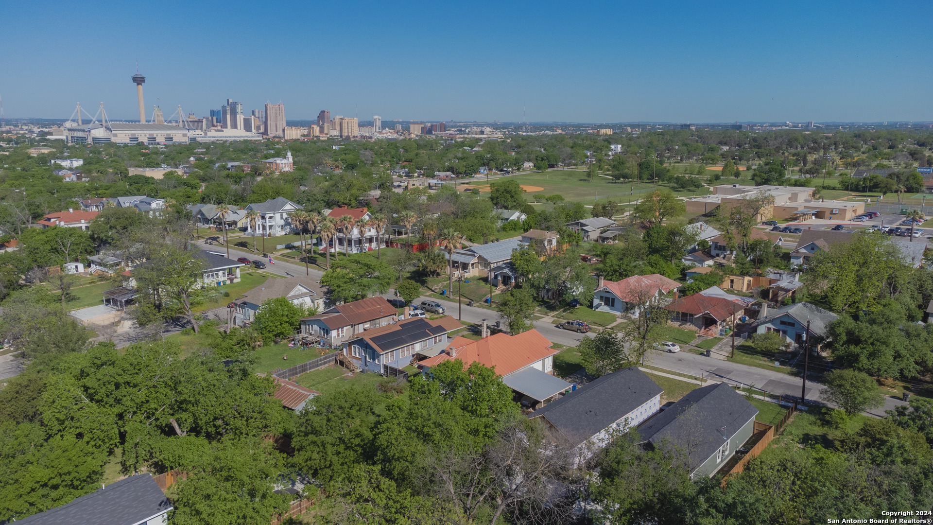 an aerial view of a city with lots of residential buildings