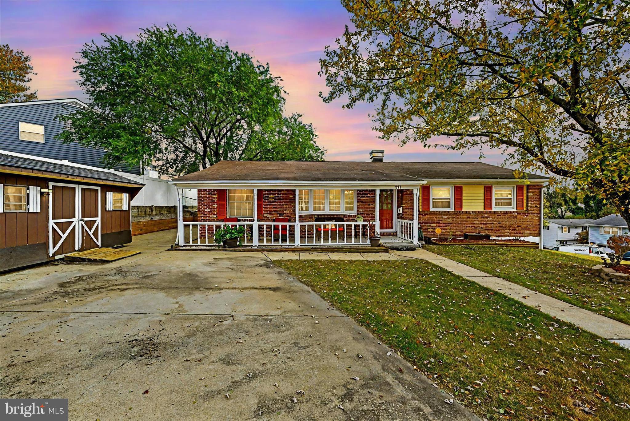 a view of a yard in front of a house