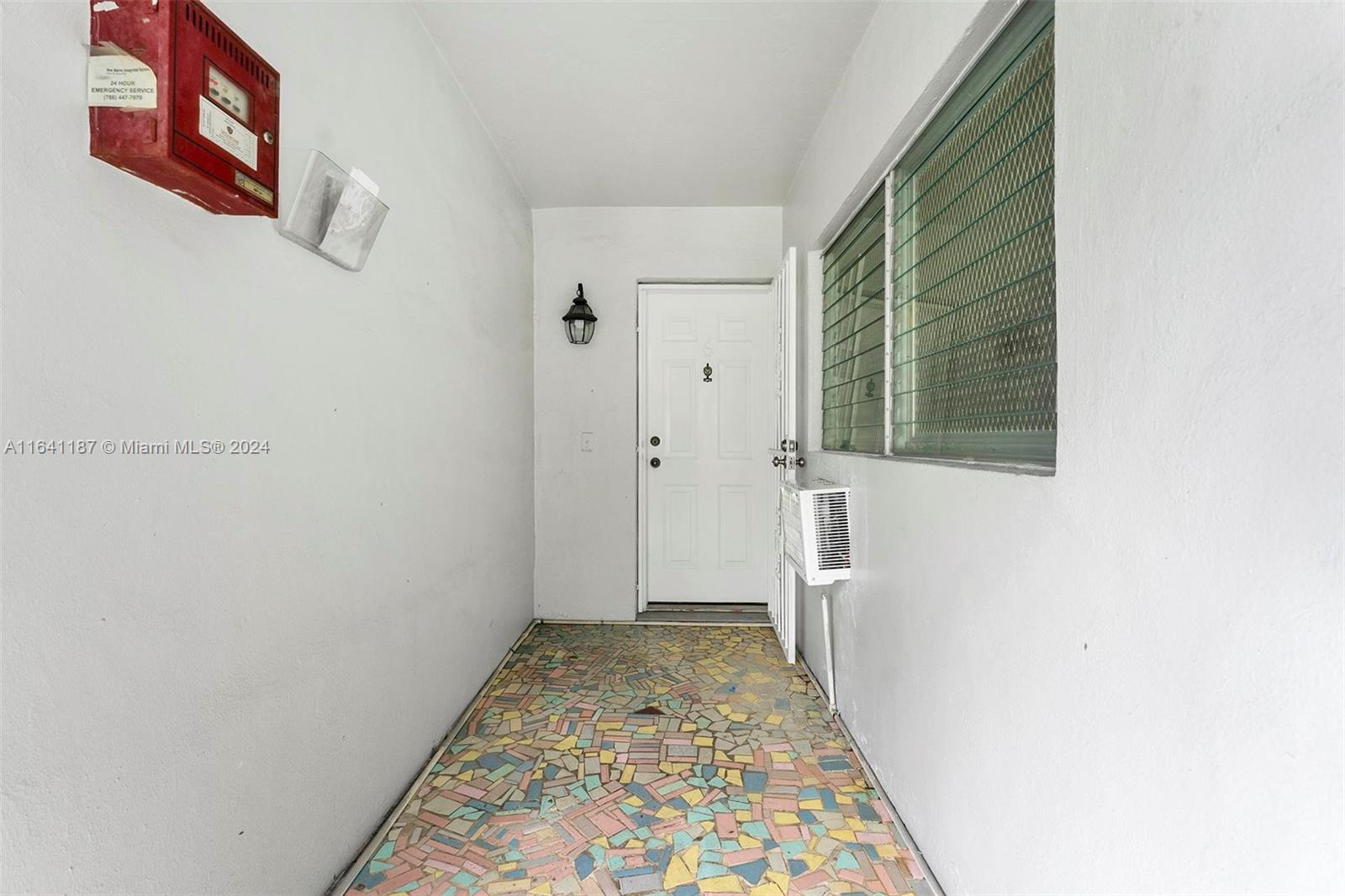 a view of hallway with windows