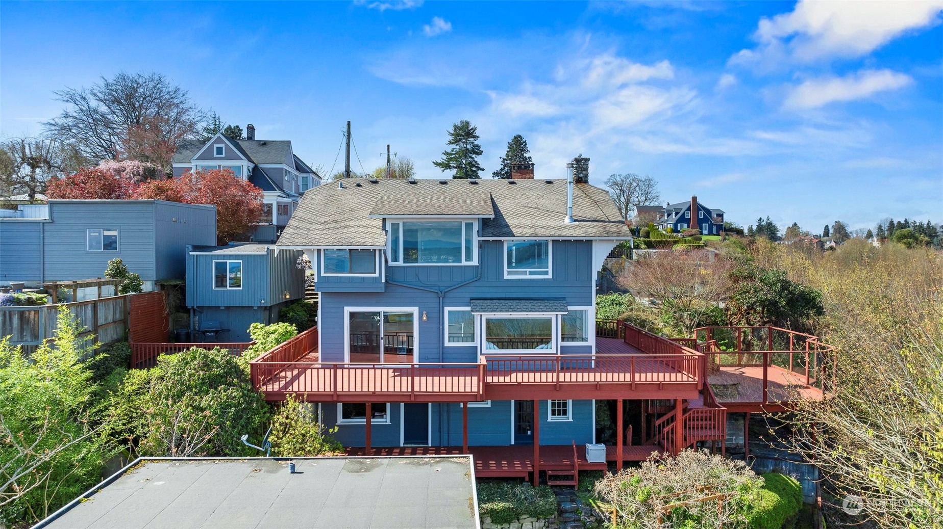 a front view of a houses with a yard