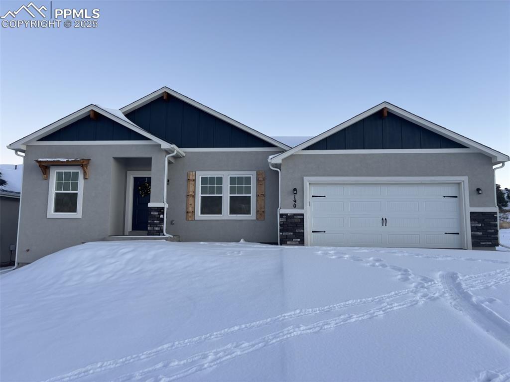 View of front of house with a garage