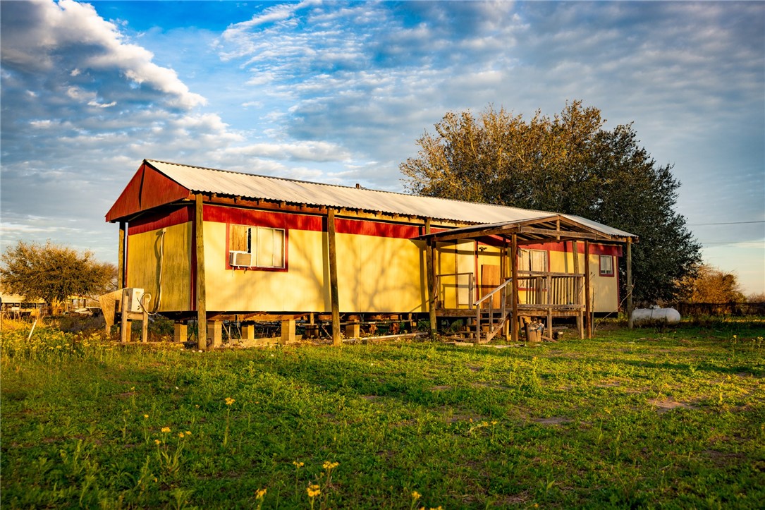 a front view of house with yard