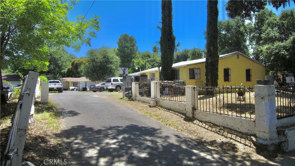 a view of street along with trees