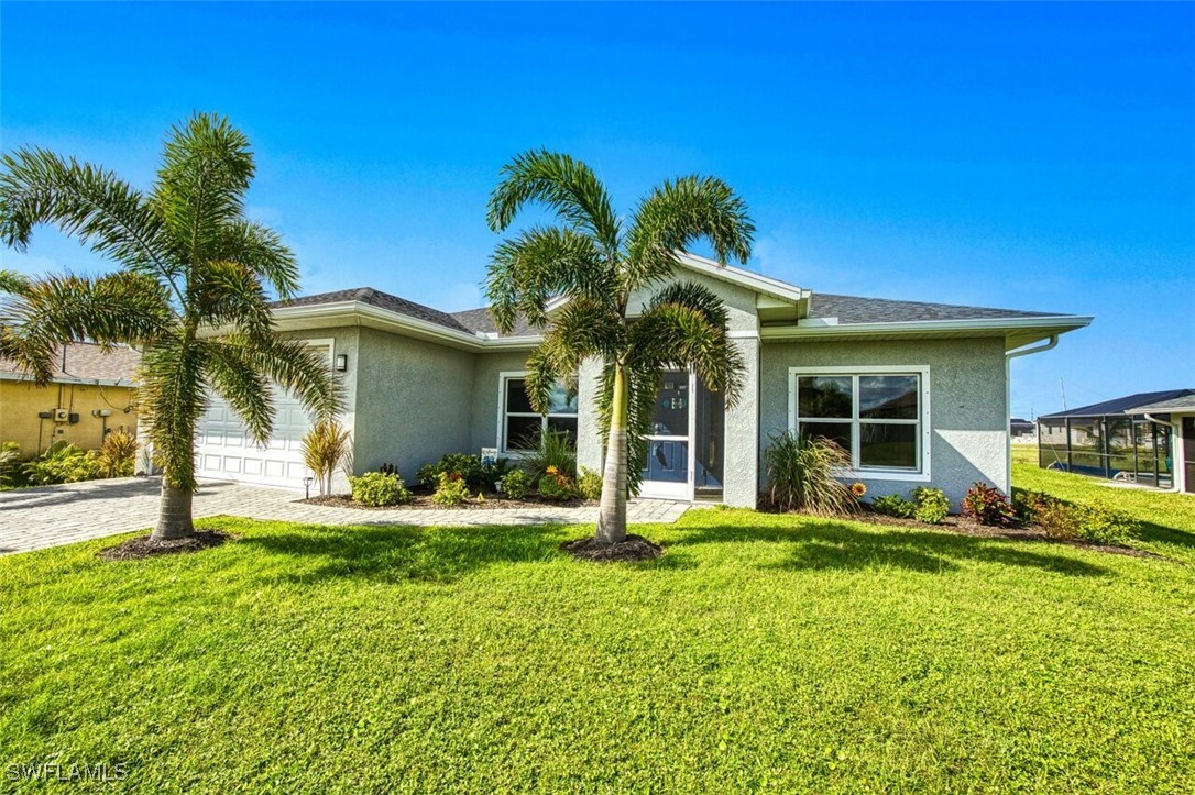 front view of a house with a yard