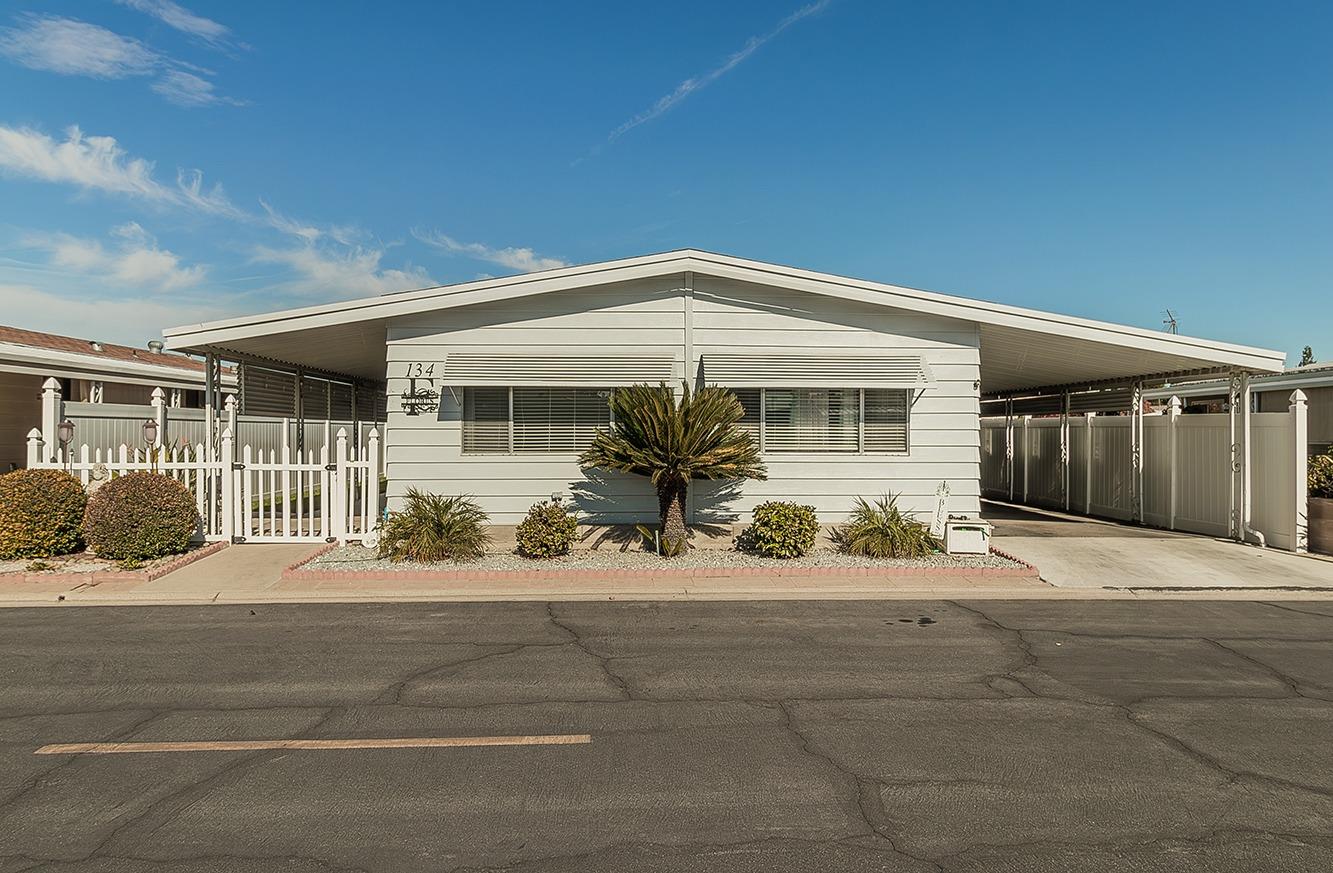 a front view of a house with a garage