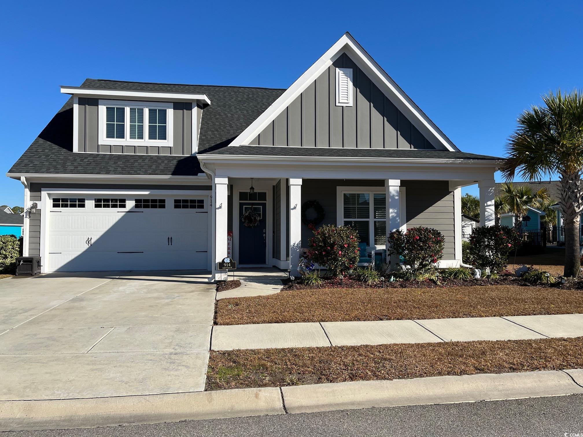 View of front of house with a garage