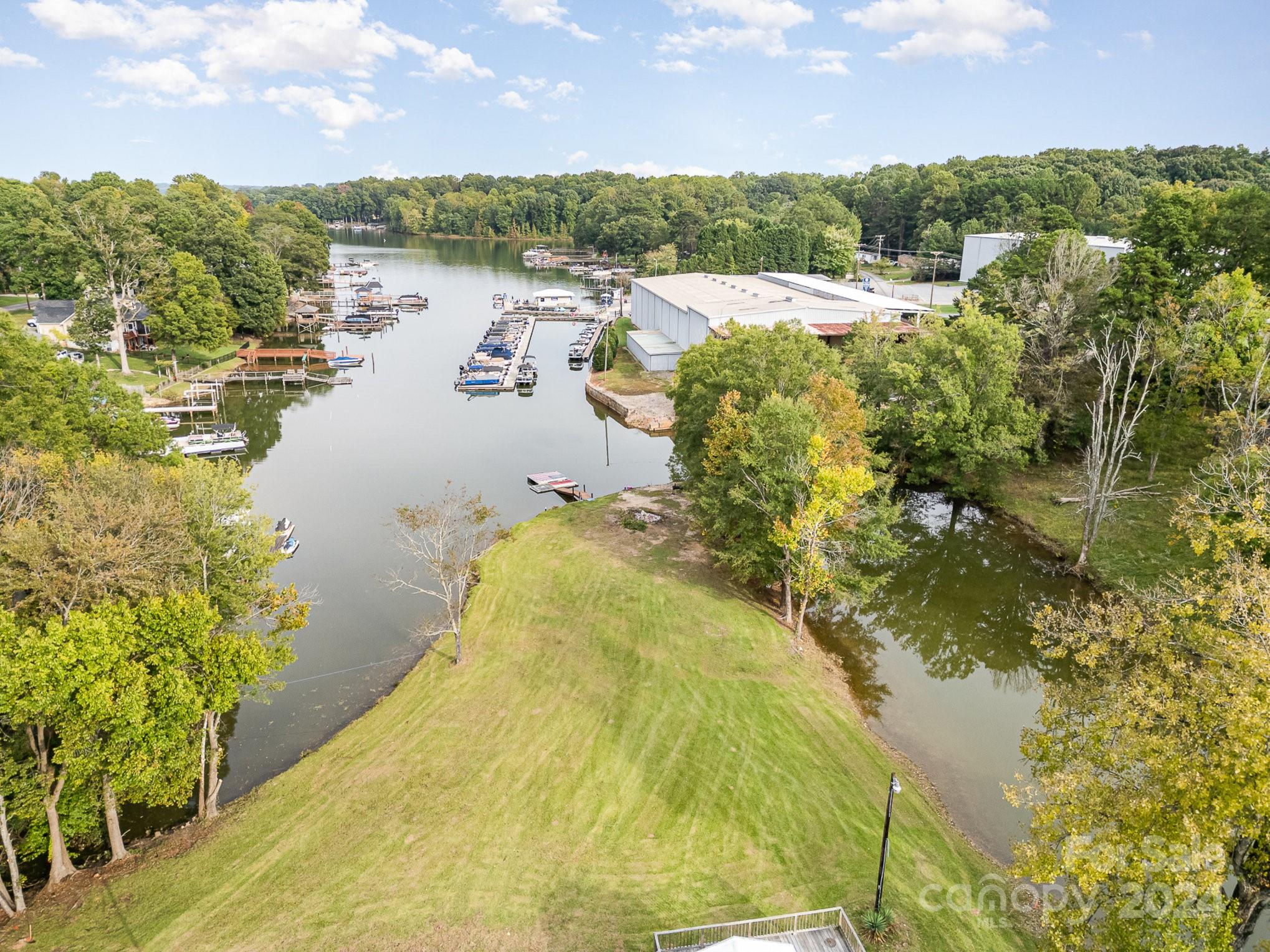 a view of a lake with a yard