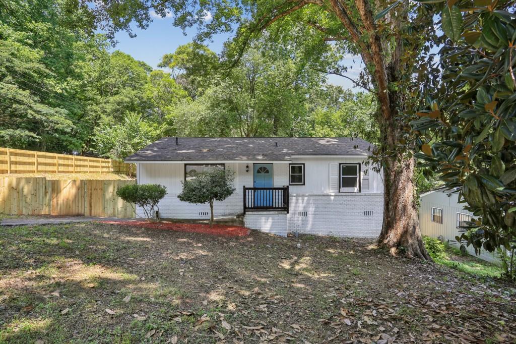 front view of a house with a big yard