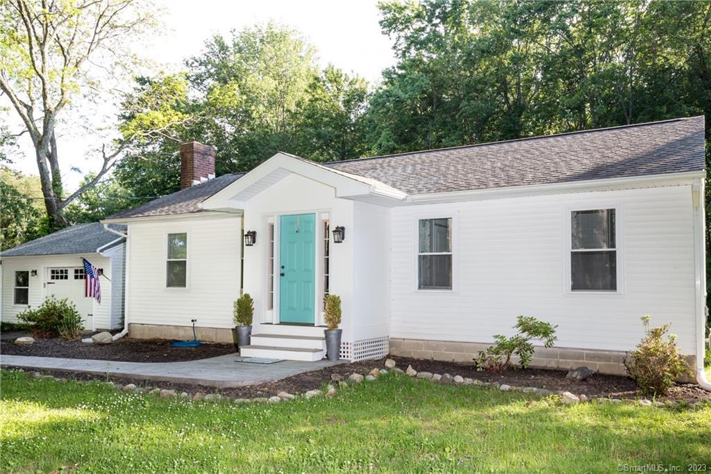 a front view of house with yard