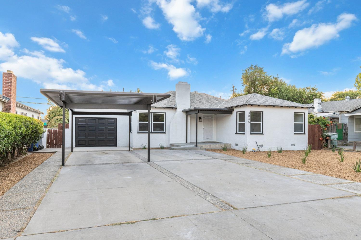 a front view of a house with a garage