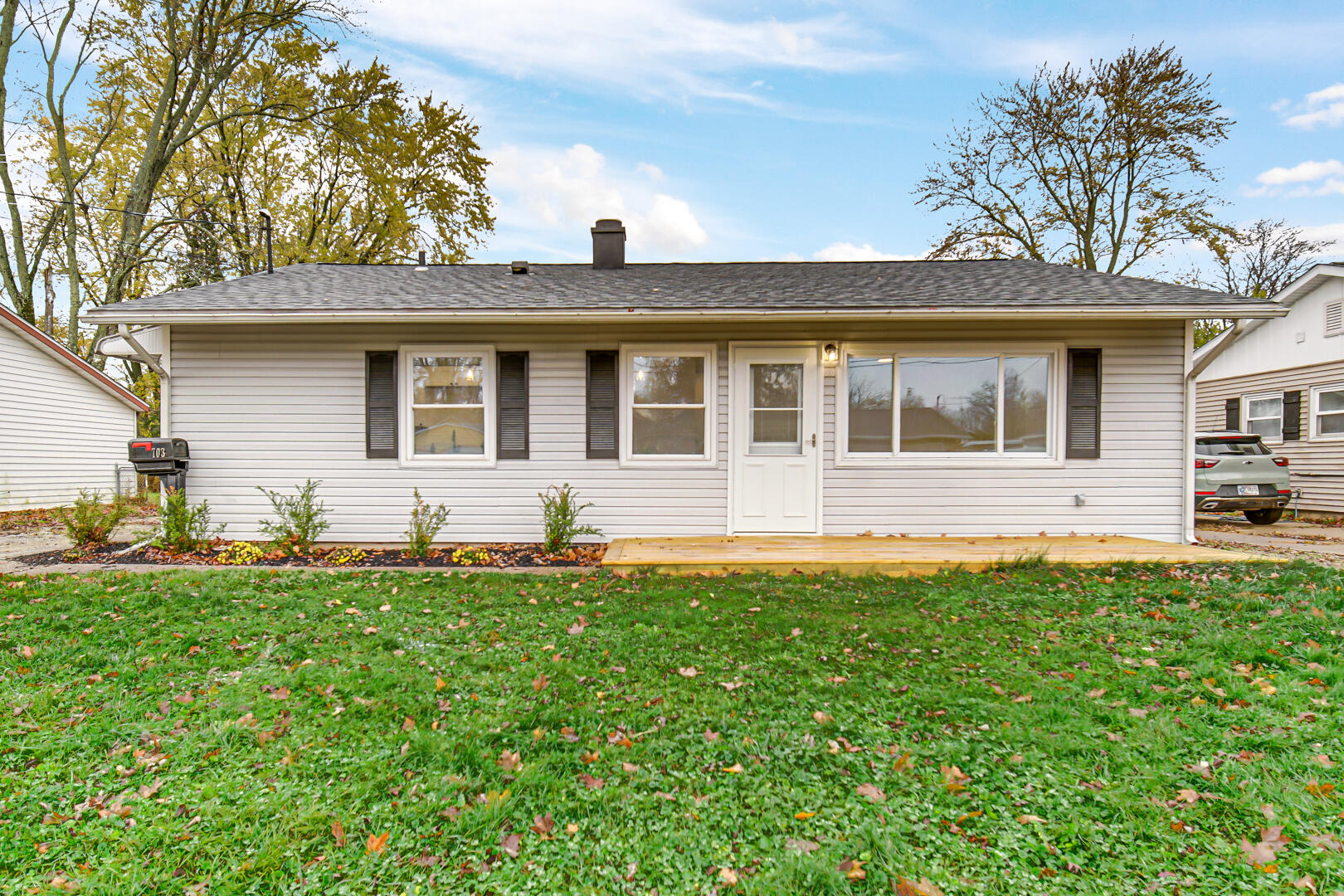 front view of a house with a yard