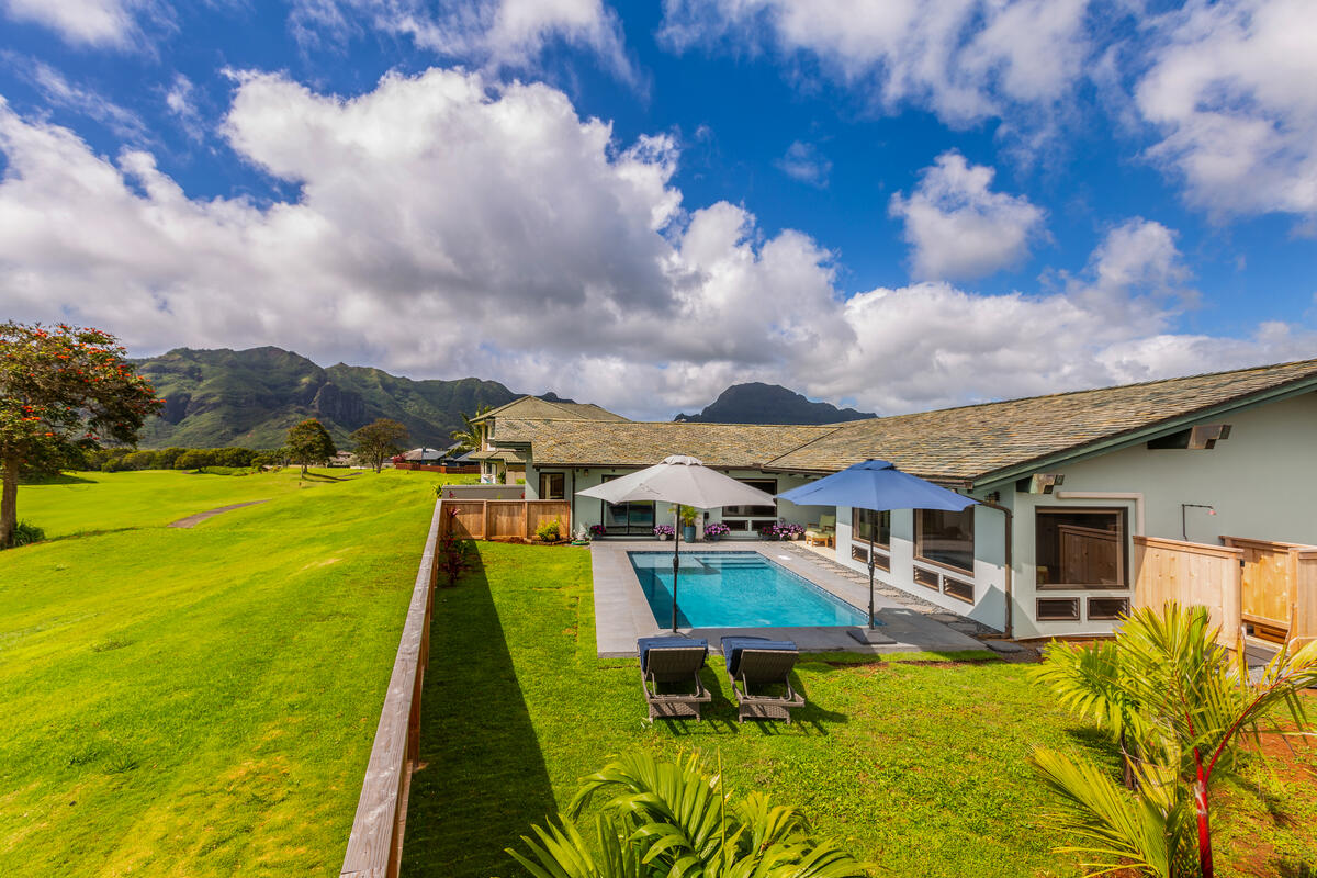 a view of swimming pool with outdoor seating