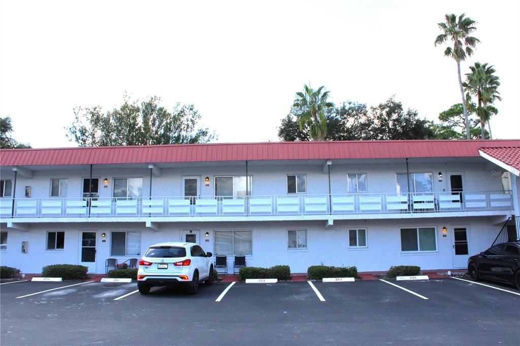 a car parked in front of a building