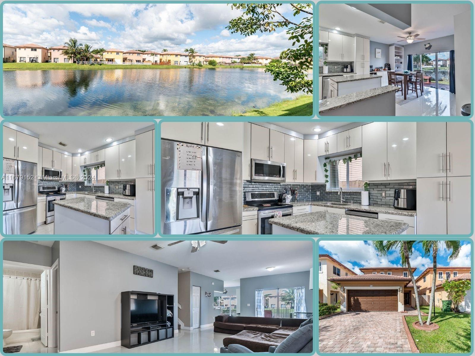 a kitchen with stainless steel appliances kitchen island granite countertop a table and chairs in it