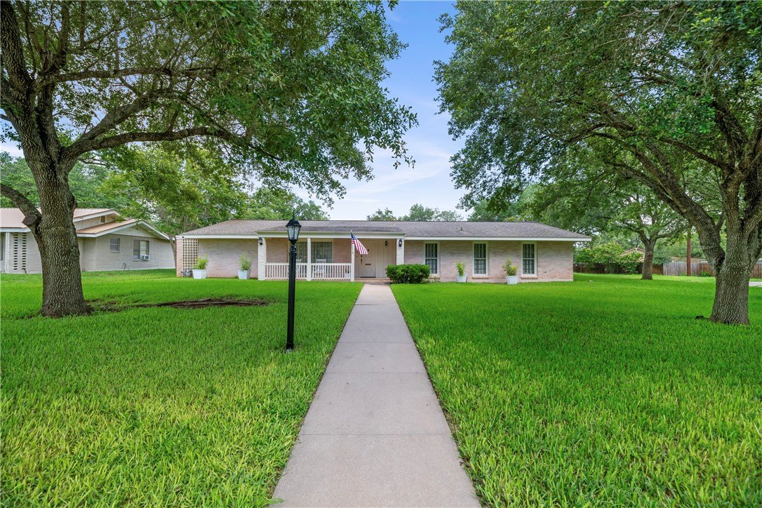 front view of a house and a yard