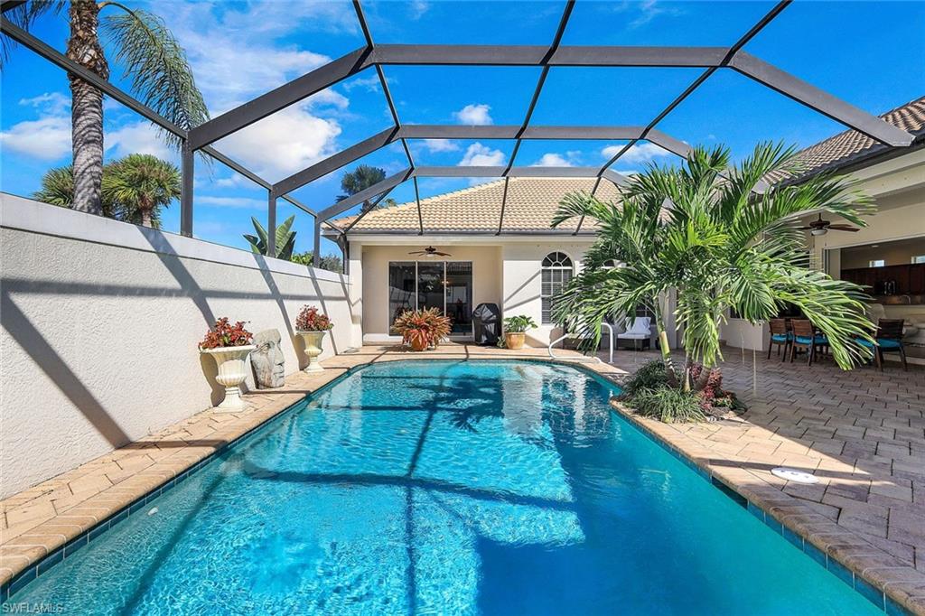 a view of a swimming pool with a patio