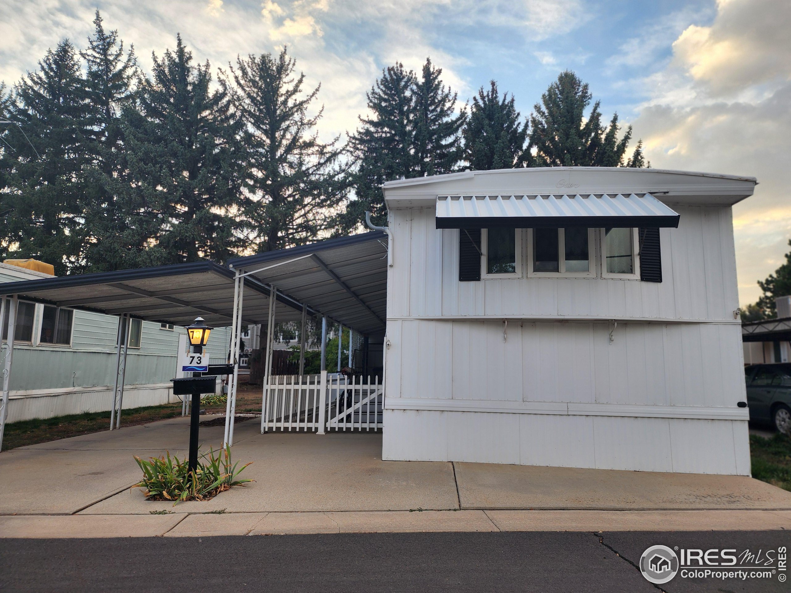 a front view of a house with garage