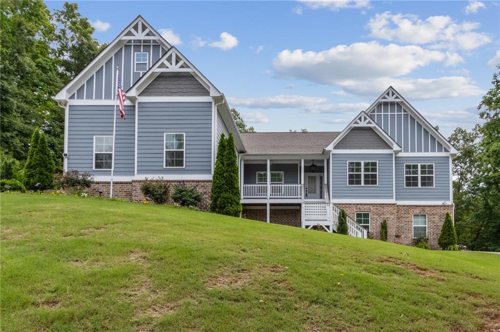 a front of a house with a yard