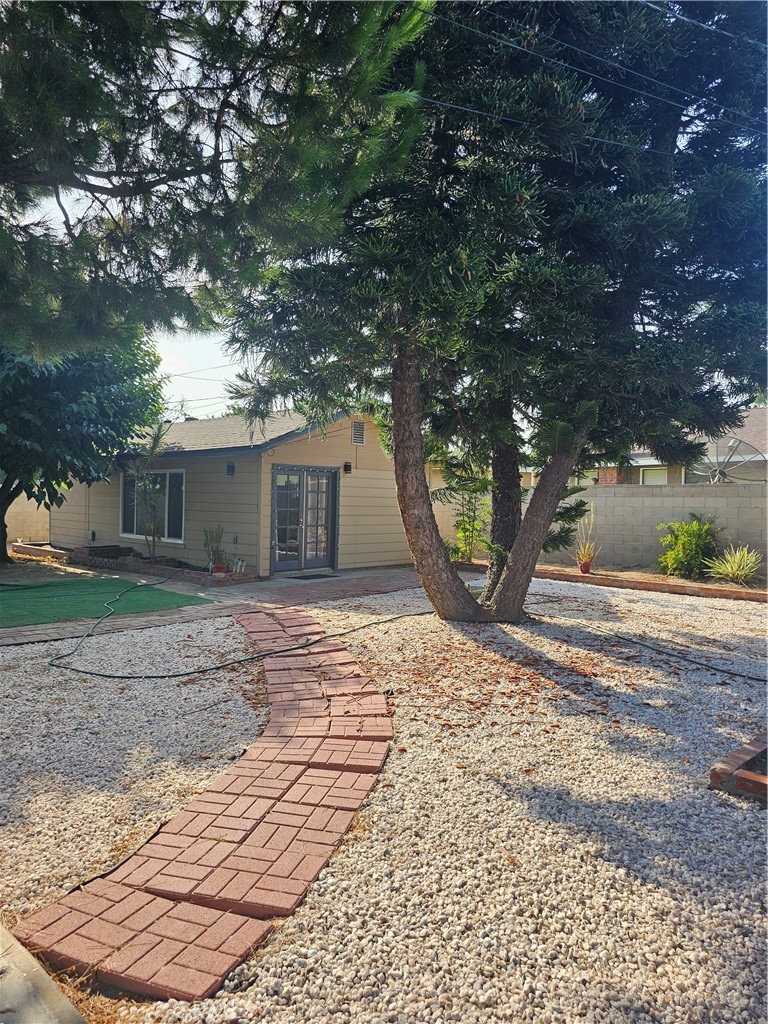 a backyard of a house with lots of green space