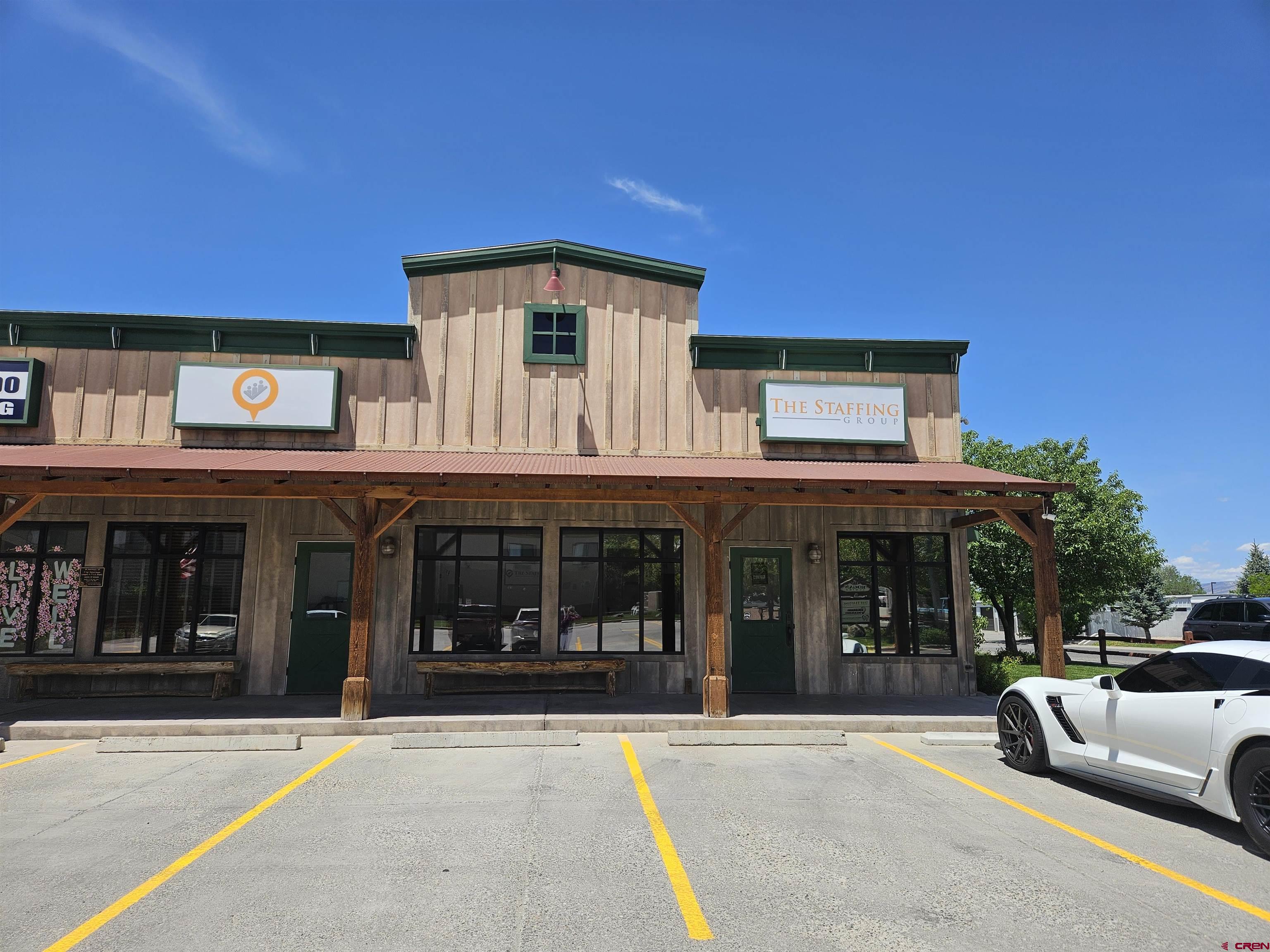 a view of a building with a porch