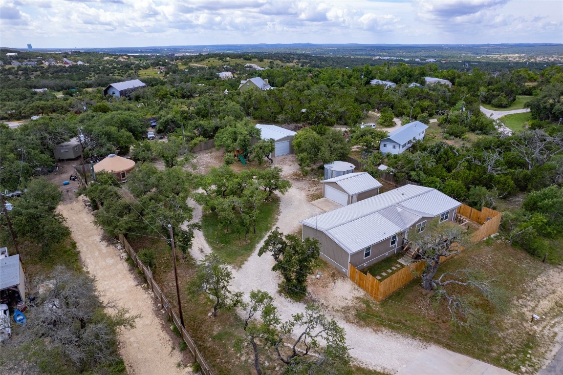 an aerial view of a house with a garden