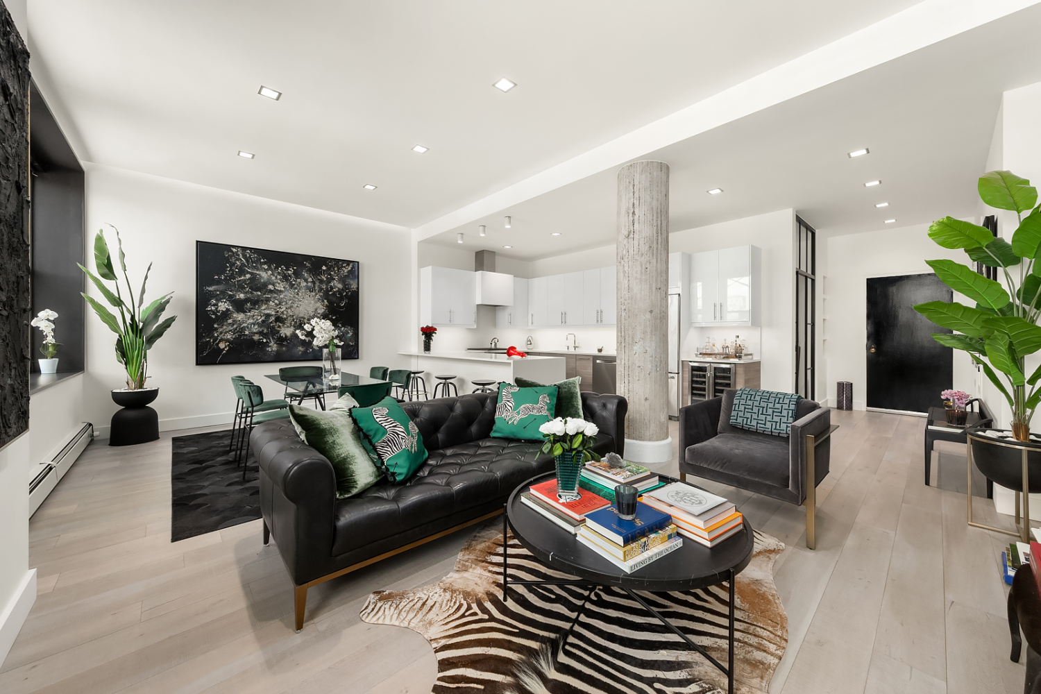 a living room with furniture and a rug