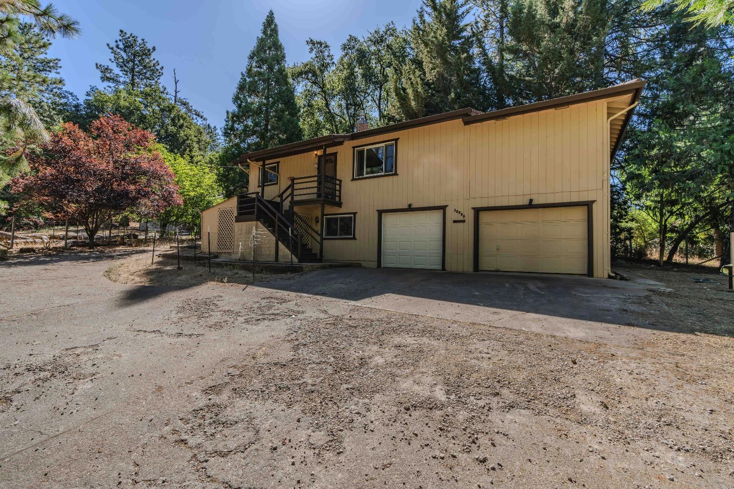 Two-car garage with plenty of uncovered parking