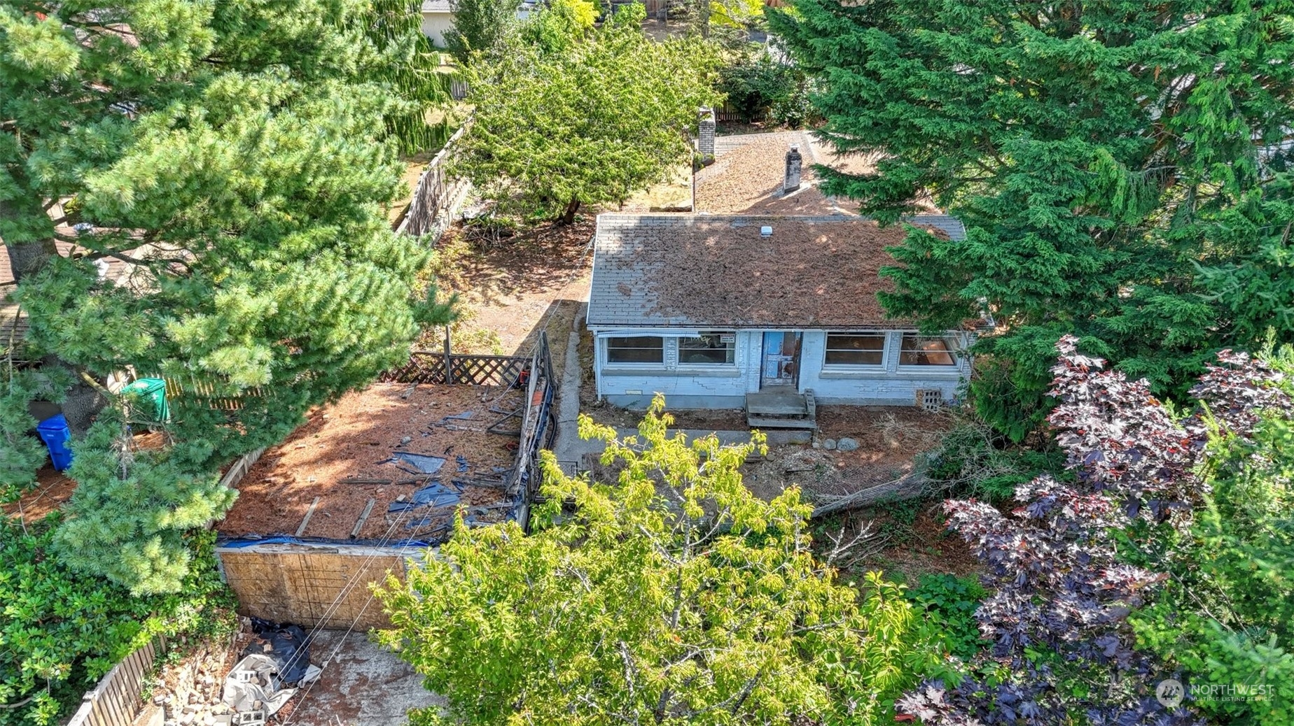 front view of a house with a garden