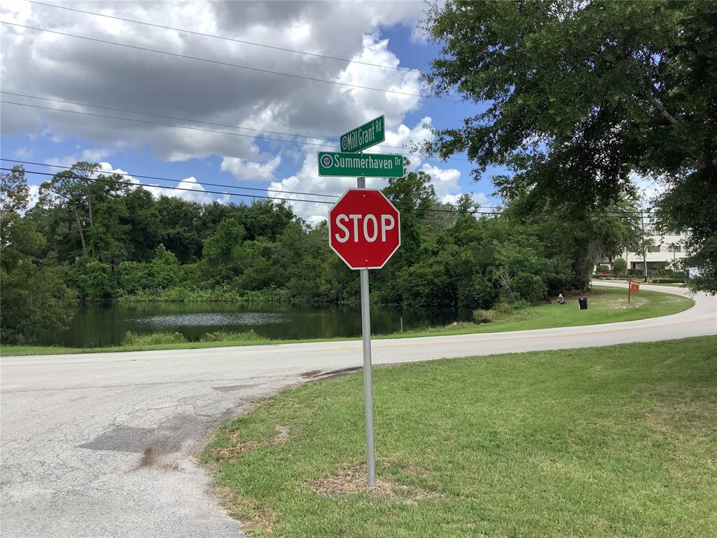 a street sign sitting on the side of a road