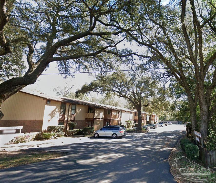 a view of a street with houses