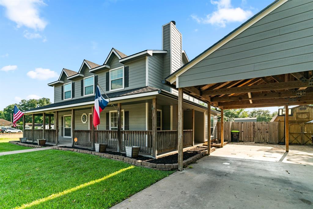 a view of an house with backyard porch and entertaining space