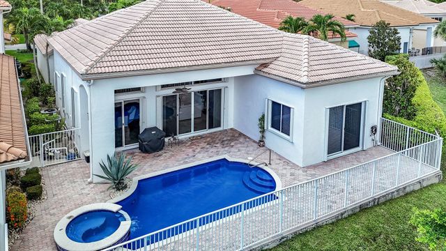 $799,900 | 7011 Mallorca Crescent | Boca Grove Plantation