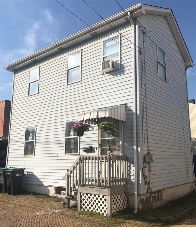 a view of a house with a deck