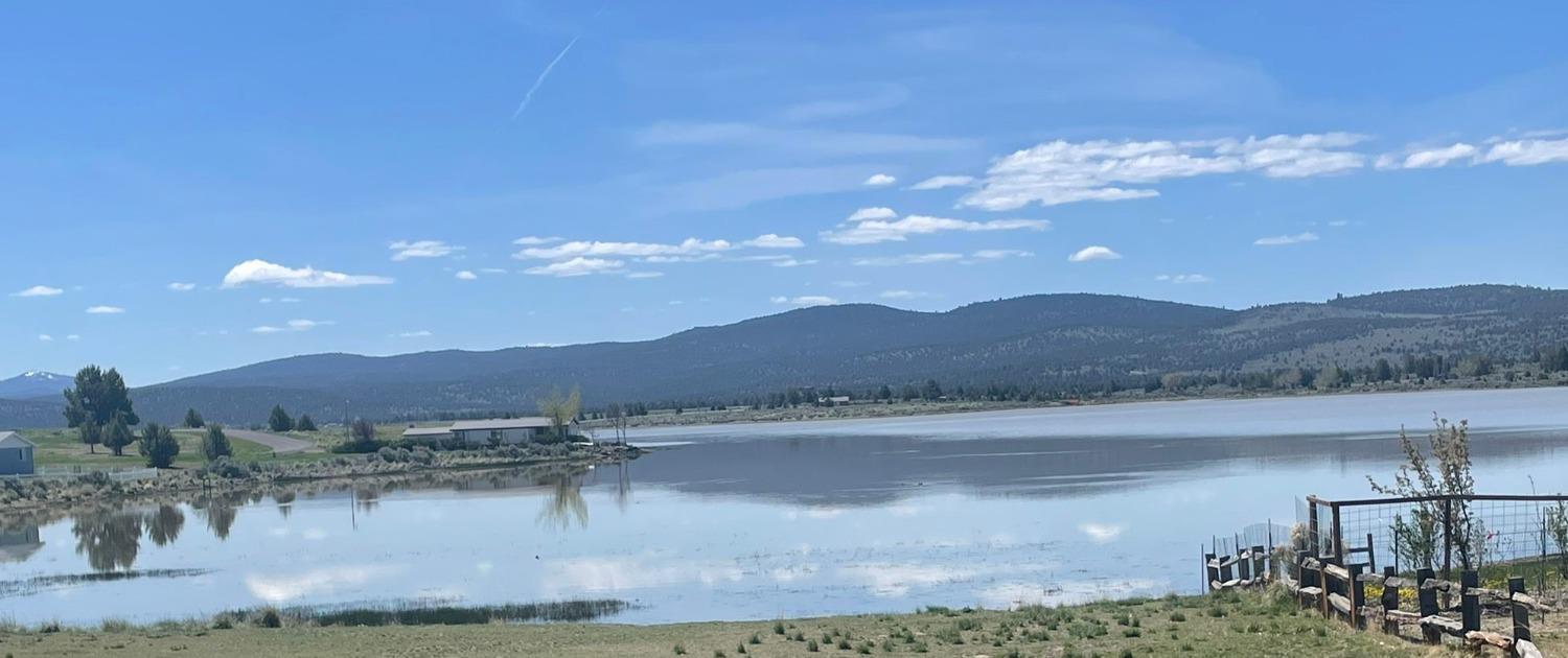 a view of lake with mountain