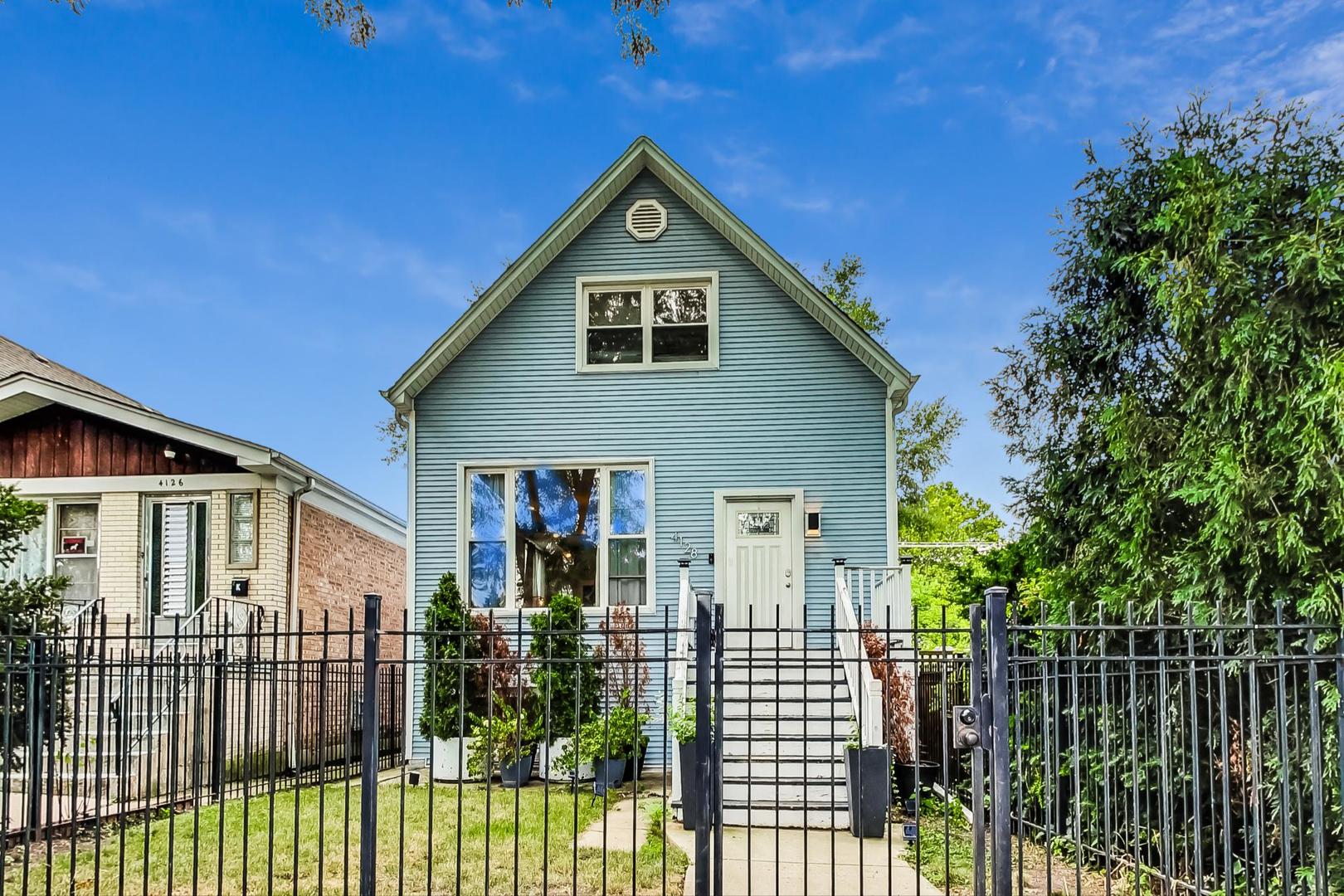 a front view of a house with a porch