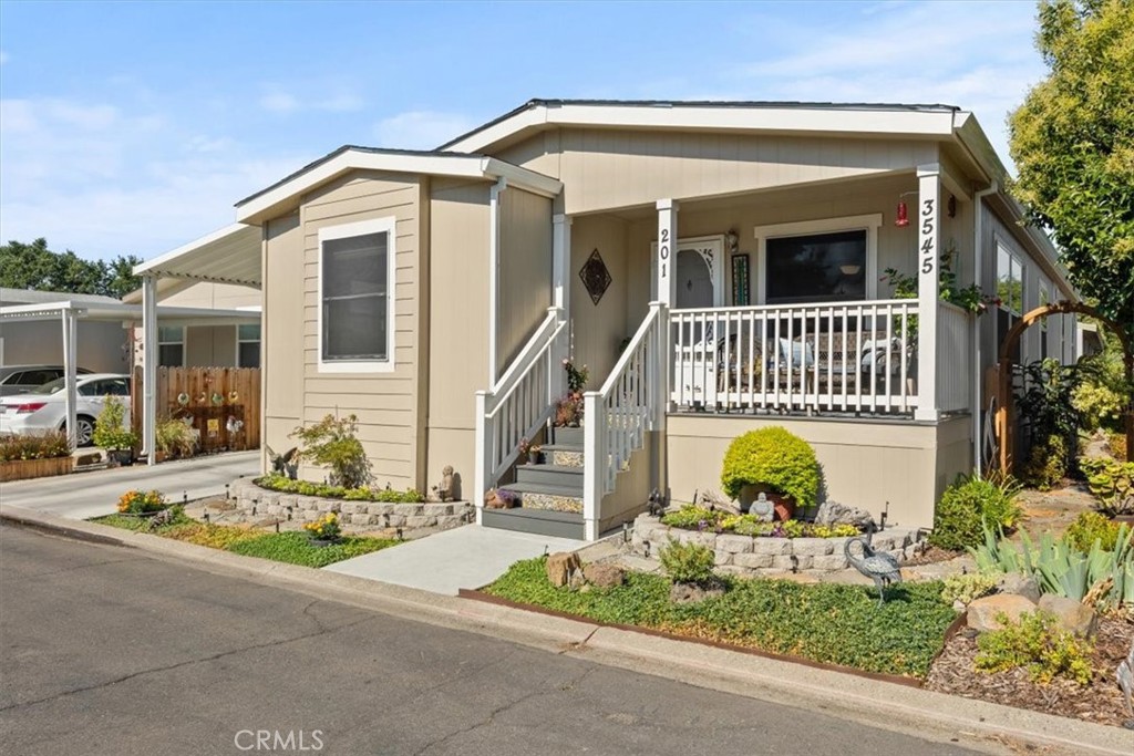 a front view of a house with entertaining space